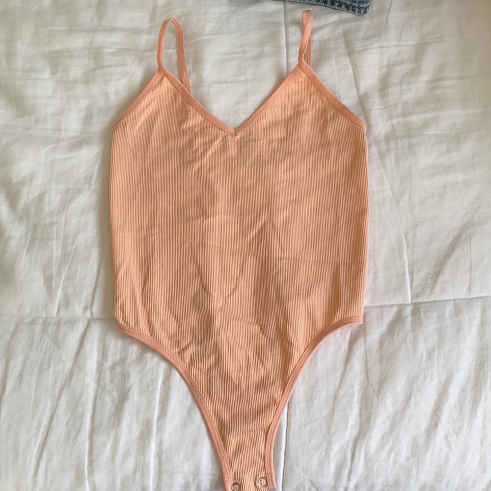 Pink bodysuit